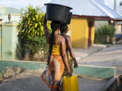 beautiful-african-women-fetching-water-from-outside